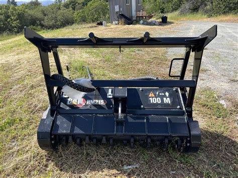 cat skid steer tree mulcher|cat hm215c mulcher for sale.